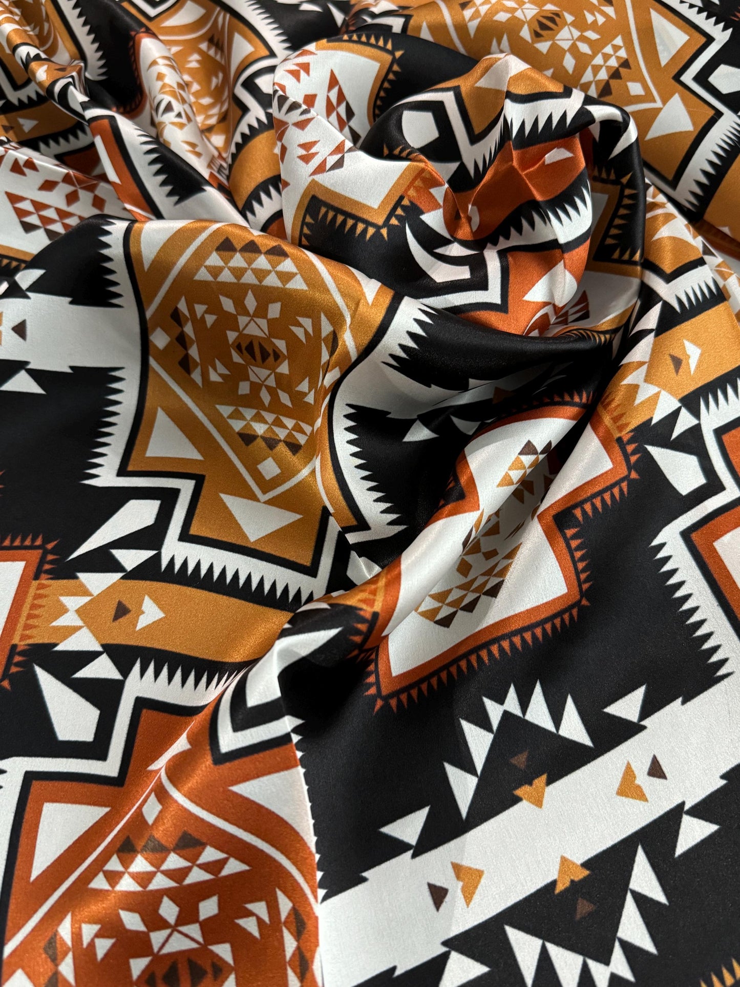100% Silk Bandana Aztec inspired pattern of brown, black, and white